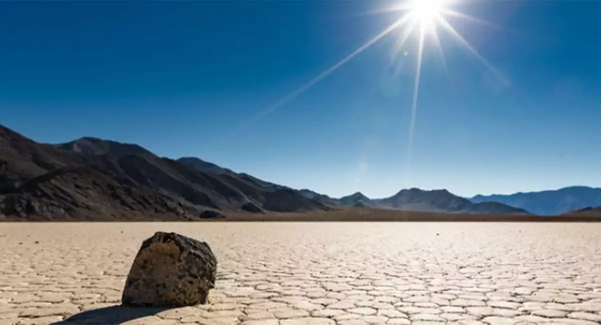 A "sailing rock" sitting in the sun at Racetrack Playa in Death Valley National Park, California