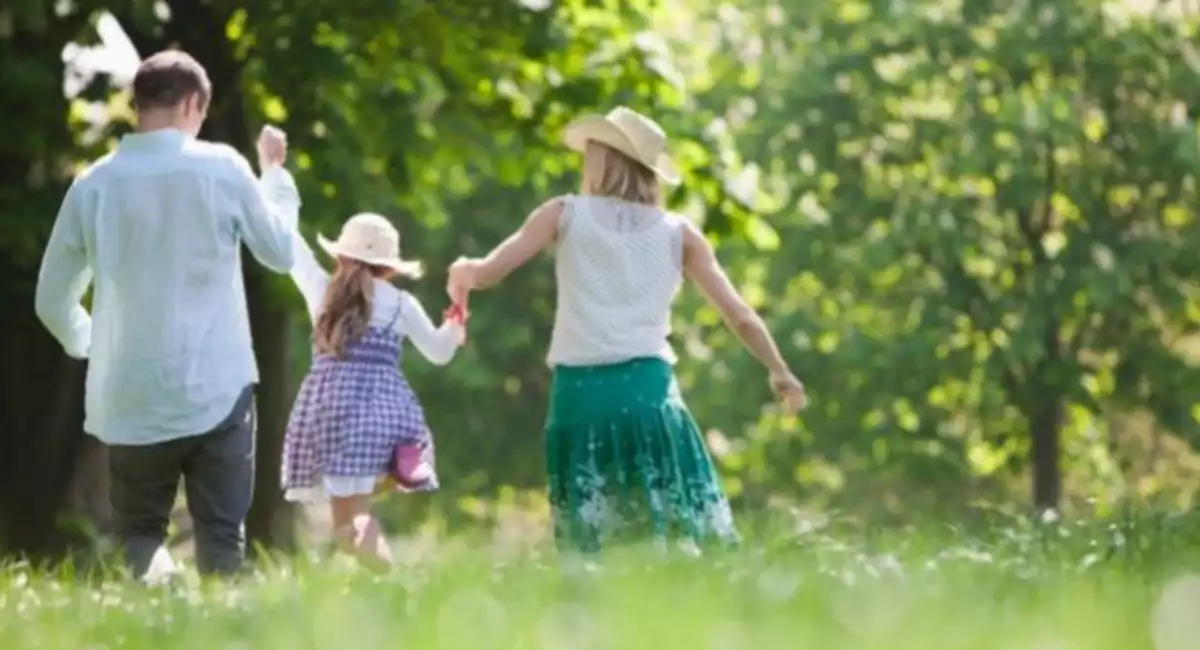 family enjoying a walk outside