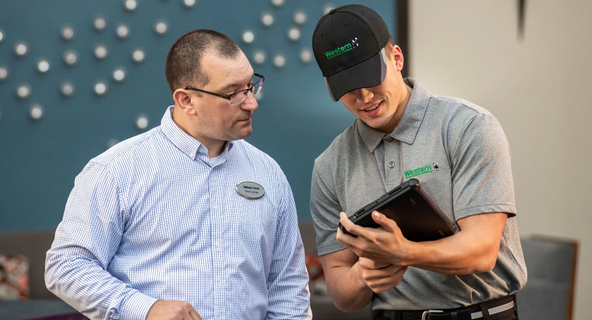 Western colleague talking to a customer 